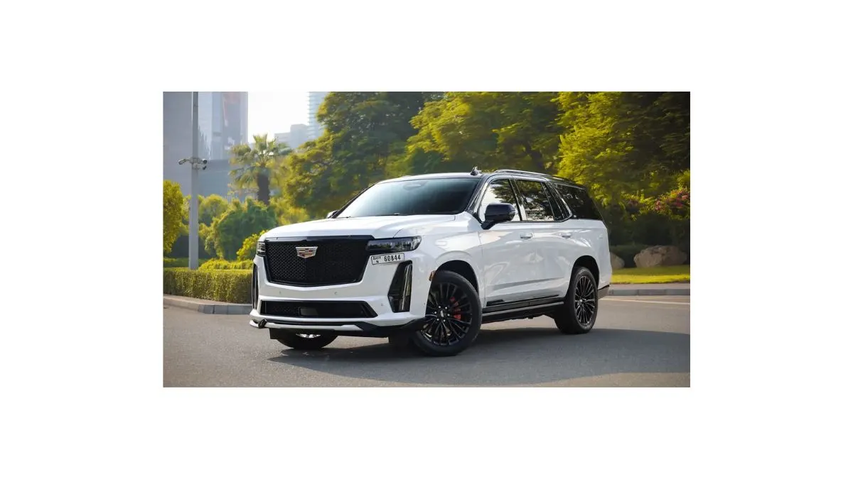 Cadillac pickup truck in metallic black with premium interior and futuristic EV design