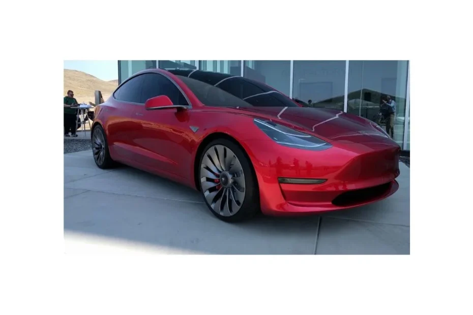Tesla Model 3 2026 electric sedan front view on U.S. highway with sleek design and modern features