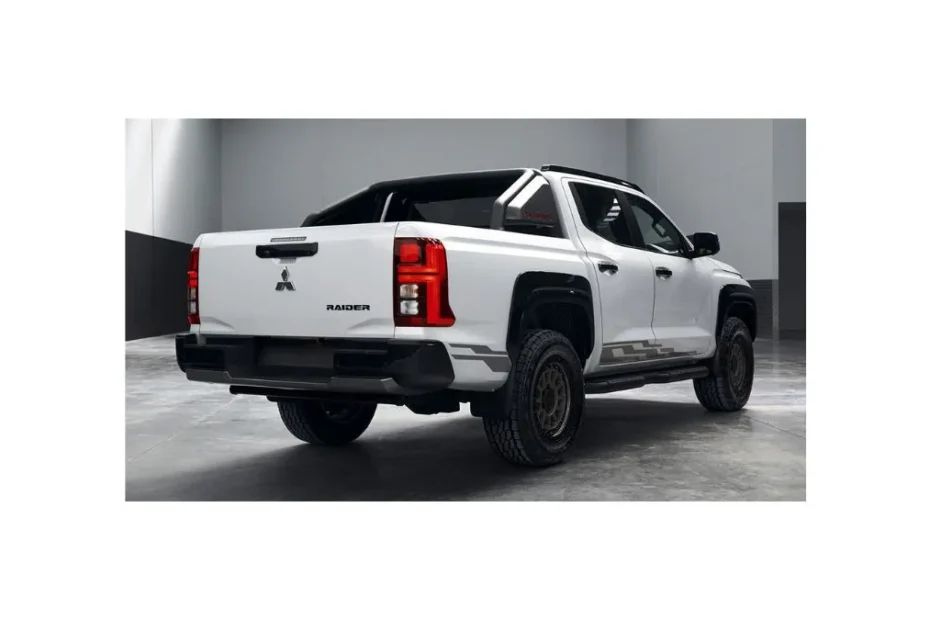 Mitsubishi Triton 2026 pickup truck with white accents and aggressive front grille design